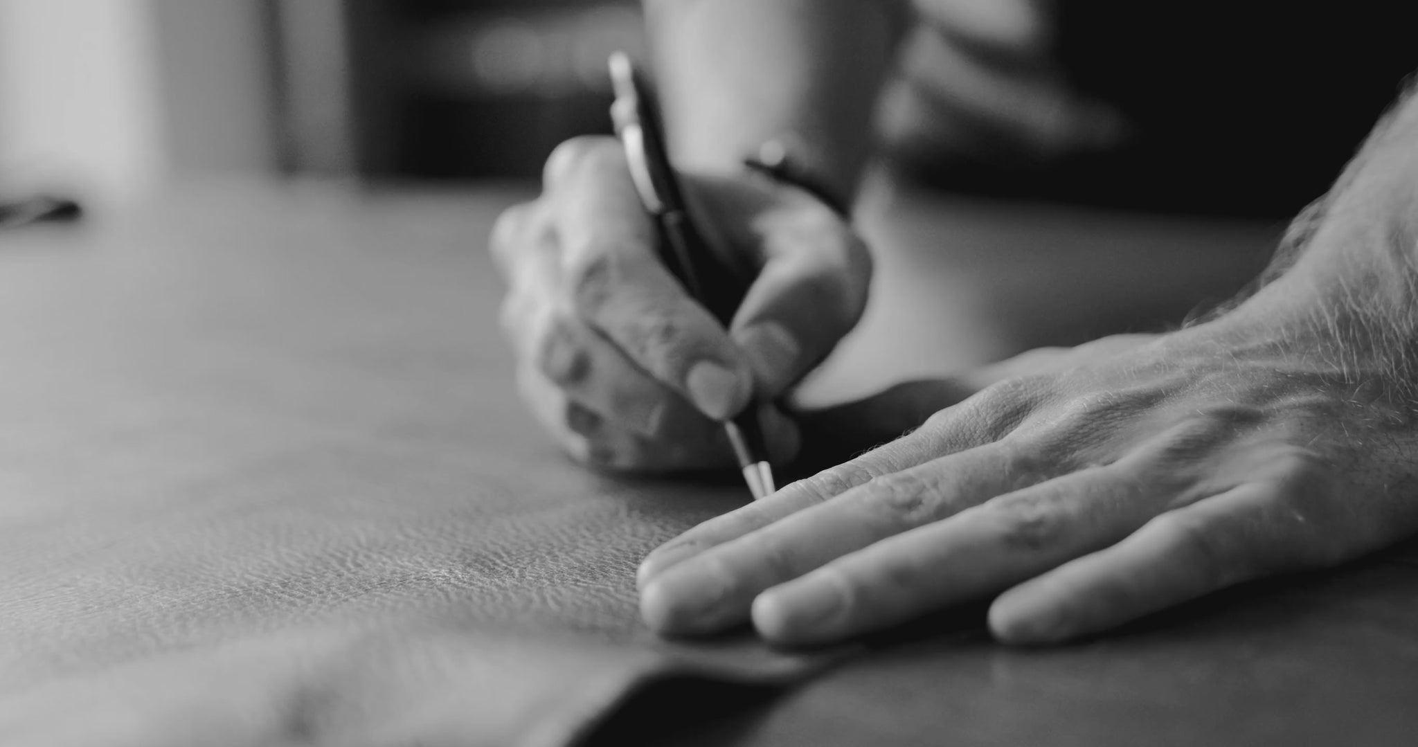 LGDO craftsman working on leather